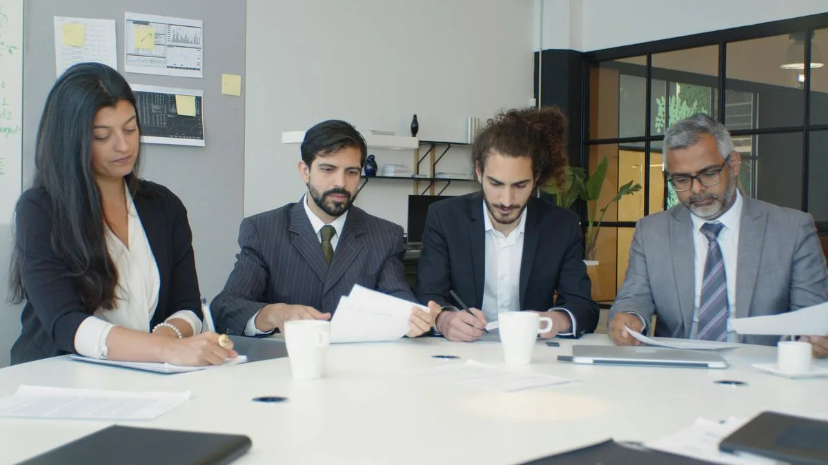 Women and man discussing cold email success rates to boost opens and respnses