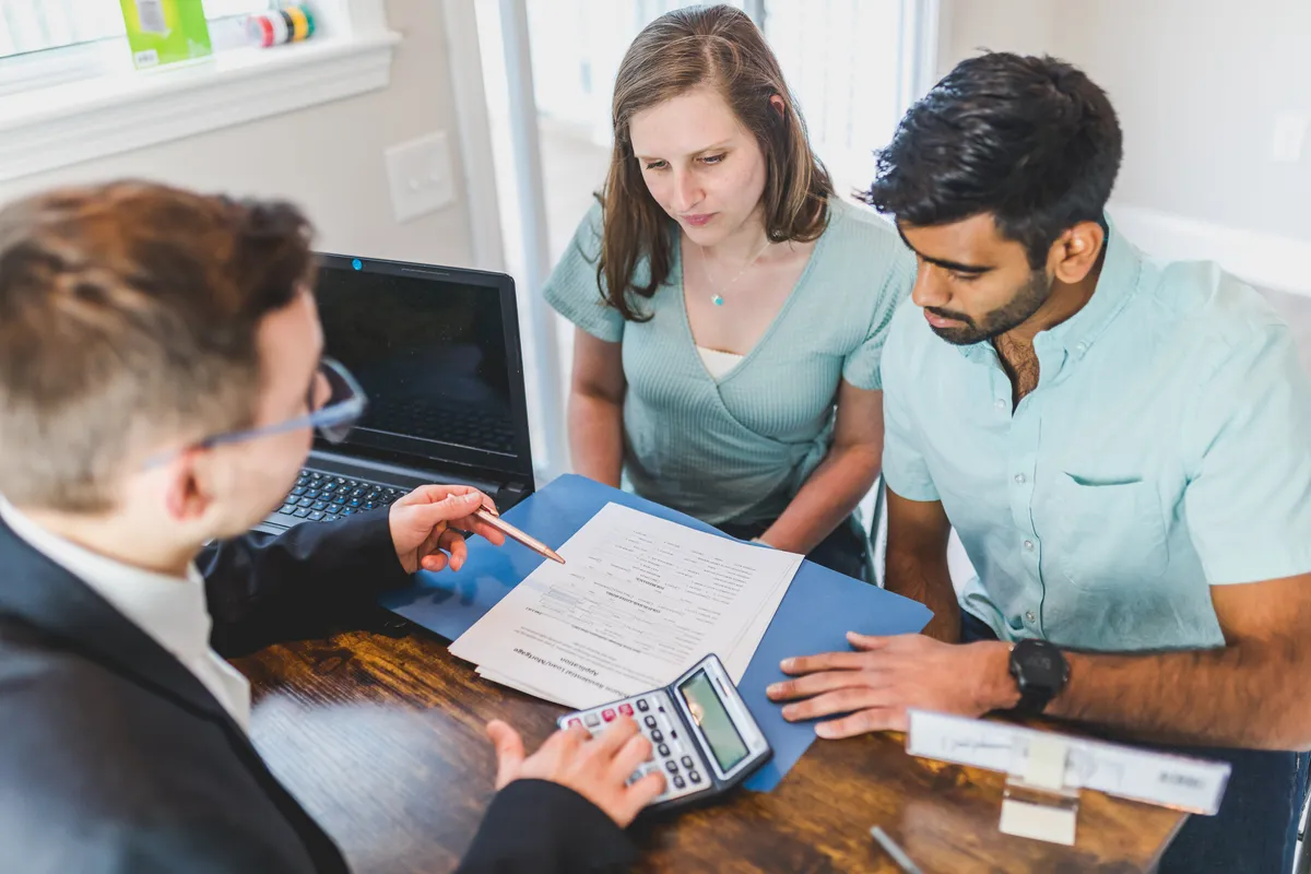 A broker discussing important matter to his client