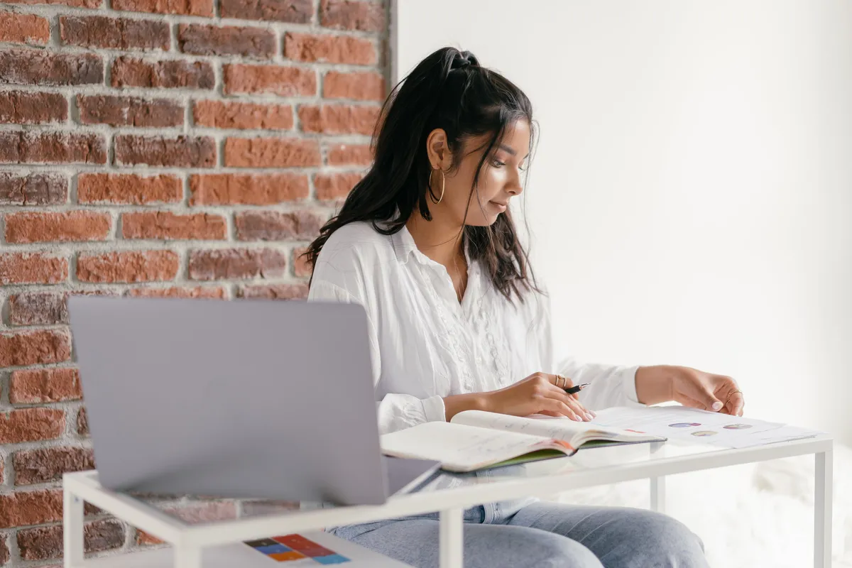 Women doing her homework about mortgage approval